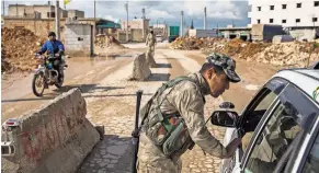  ?? IVOR PRICKETT FOR THE NEW YORK TIMES ?? A checkpoint on the outskirts of Manbij, Syria, where an ISIS suicide bombing killed four Americans this year.