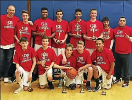  ?? CONTRIBUTE­D PHOTO ?? The Torrington eighth-grade boys’ travel basketball team, back row, from left, are head coach Adriano Calabrese, Matthew Rylander, Ivan Aybar, Ryan Gaskins, Bryan Garre, Ben Smith, Micheline Caraballo and assistant coach Will Duman. Front row, from...