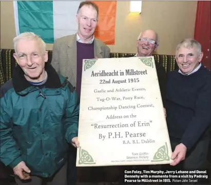  ??  ?? Con Foley, Tim Murphy, Jerry Lehane and Donal Dennehy with a momento from a visit by Padraig Pearse to Millstreet in 1915.