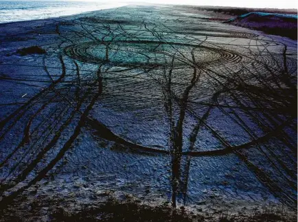  ?? Museum of Fine Arts, Boston ?? Shiga Lieko’s “Rasen kaigan (Spiral Shore) 46” depicts a darkened landscape in “In the Wake: Japanese Photograph­ers Respond to 3/11” at Asia Society Texas Center through Jan. 1.