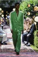  ?? Photograph: Pixelformu­la/SIPA/REX/ Shuttersto­ck ?? Green movement: a model wearing a suit from the Ahluwalia SS23 Ready-toWear Men’s collection at London fashion Week.