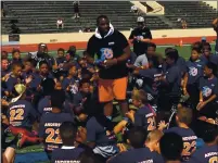  ?? THOMAS GASE — TIMES-HERALD, FILE ?? Vallejo native and NFL running back C.J. Anderson talks to kids at his free camp held in Vallejo. Anderson announced his retirement on Friday.