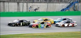  ?? ASSOCIATED PRESS ?? KURT BUSCH (1) leads Kyle Busch (18), Joey Logano (22), Brad Keselowski (2) and Martin Truex Jr. (19) following a restart during the NASCAR Cup Series auto race at Kentucky Speedway in Sparta, Ky., Saturday.