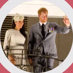  ??  ?? The Duke and Duchess of Sussex, Prince Harry and Meghan Markle, wave to the cheering crowd from the top balcony of the Grand Pacific Hotel in Suva on October 23, 2018