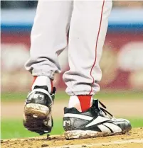  ?? RICH PILLING GETTY IMAGES FILE PHOTO ?? Curt Schilling’s post-season record, including the infamous bloody sock game in the 2004 World Series, is Hall of Fame worthy. But his support for the U.S. Capitol riot changes the playing field — in this of all years, Bill Madden writes.