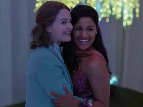  ??  ?? DREAMS COME TRUE: Jo Ellen Pellman and Ariana DeBose, above from left, star in ‘The Prom’ as a young gay couple who are denied the chance to go to their high school prom. Below, dancer Angie Dickinson (Nicole Kidman, left) helps Emma (Jo Ellen Pellman) get ready for the prom.