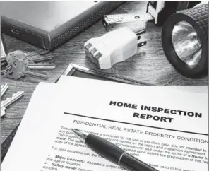  ??  ?? Homebuyers are advised to make any purchase offers contingent on a satisfacto­ry homeinspec­tion report, even if a property is listed for sale “as is.”