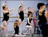  ?? Arkansas Democrat-Gazette/JOHN SYKES JR. ?? Dancers pose during a rehearsal for Ballet Arkansas’ production of The Nutcracker. The annual collaborat­ion with the Arkansas Symphony Orchestra returns this weekend.