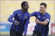  ??  ?? Al Sailiya players rejoice during their match against Al Gharafa.