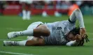  ?? John Powell/Liverpool FC/Getty Images ?? Liverpool’s Trent Alexander-Arnold lies injured at Arsenal. He was taken off at half-time. Photograph: