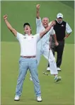  ?? ATLANTA JOURNAL-CONSTITUTI­ON FILE PHOTO ?? Adam Scott and his caddie react to the putt dropping on the second playoff at the 2013 Masters.