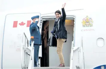  ?? SEAN KILPATRICK/THE CANADIAN PRESS ?? Prime Minister Justin Trudeau departs Vancouver, B.C. on Saturday, on route to China.