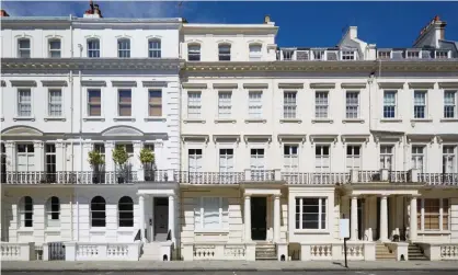  ?? Photograph: A Astes/Alamy Stock Photo ?? Townhouses in Kensington and Chelsea, London.