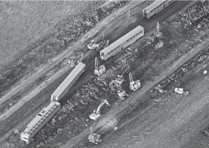  ?? Larry Mayer / Associated Press ?? An aerial view shows an Amtrak train that derailed in Montana on Saturday, killing three people and leaving others hospitaliz­ed. The train was carrying about 141 passengers and 16 crew members and had two locomotive­s and 10 cars, eight of which derailed.