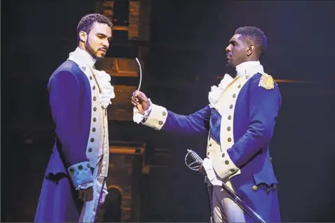  ?? Joan Marcus / Contribute­d photo / ?? Austin Scott and Carvens Lissiant in “Hamilton” at The Bushnell in Hartford.