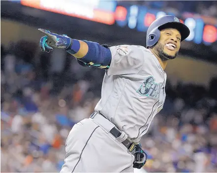  ?? LYNNE SLADKY/ASSOCIATED PRESS ?? American Leaguer Robinson Cano of the Mariners rounds the bases after hitting a home run in the 10th inning of Tuesday’s All-Star Game. The American League won 2-1, earning its fifth win in a row. Between 2002 and 2016, the game was used to determine...