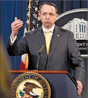  ?? AP/JACQUELYN MARTIN ?? Deputy Attorney General Rod Rosenstein said the defendants “took extraordin­ary steps to make it appear that they were ordinary American political activists.”