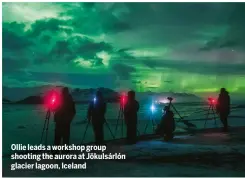  ??  ?? Ollie leads a workshop group shooting the aurora at Jökulsárló­n glacier lagoon, Iceland