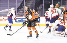  ?? DERIK HAMILTON/AP ?? The Flyers’ Travis Konecny waits for play to resume Saturday against the Washington Capitals in Philadelph­ia.