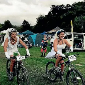  ??  ?? Team Bridal Gear, Deborah Morris, left, and Faye McKenzie, both from Motueka take part in last year’s Kaiteriter­i Six Hour.