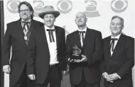  ?? ASSOCIATED PRESS FILE PHOTO ?? Jerry Douglas, from left, Shawn Camp, John Warren and Charlie Cushman, of The Earls Of Leicester, won a Grammy in 2015 for best bluegrass album for “The Earls Of Leicester” at the 57th annual Grammy Awards in Los Angeles.