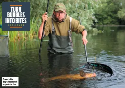  ??  ?? Foxed – the day’s first tench on pole tactics.