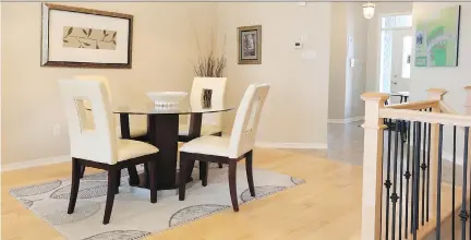 ?? JEAN LEVAC/OTTAWA CITIZEN ?? The open layout and light maple floors make the dining room in the Thornhill model feel bright and spacious.