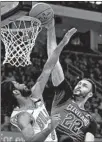  ?? RON SCHWANE/AP ?? Cavaliers’ Larry Nance Jr. (22) dunks against Bulls’ Coby White (0) in the first half Saturday in Cleveland.