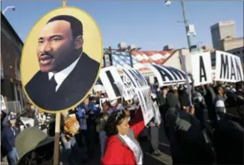  ?? MARK HUMPHREY — THE ASSOCIATED PRESS ?? People gather for events commemorat­ing the 50th anniversar­y of the assassinat­ion of the Rev. Martin Luther King Jr. on Wednesday in Memphis, Tenn. King was assassinat­ed while in Memphis supporting striking sanitation workers.