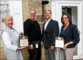  ?? JONATHAN TRESSLER — THE NEWS-HERALD ?? From left, Willo Hill Christian School’s Cathy Platano and, from Avery Dennison, Kyle Rhodes, Collin Moore and Patti Hubbard pose with the awards bestowed upon them by Partners in Science Excellence during the nonprofit group’s spring meeting at the...