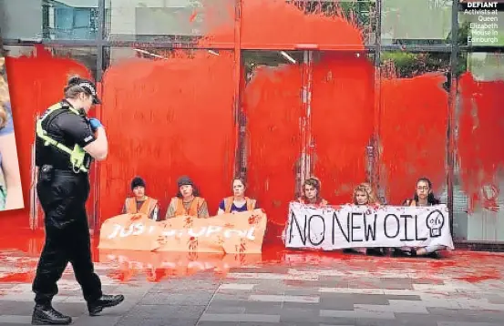  ?? DEFIANT Activists at Queen Elizabeth House in Edinburgh ??