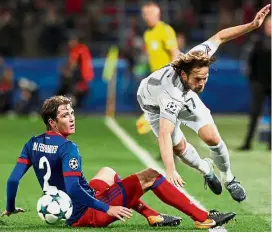  ?? — Reuters ?? Rough in Russia: Manchester United’s Daley Blind is fouled by CSKA Moscow’s Mario Fernandes.