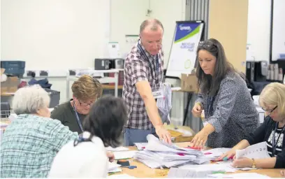  ?? Picture: Matthew Horwood ?? Ballot papers are counted for the Wales count in the European Parliament elections.