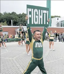  ?? JOHN LOVE / SENTINEL & ENTERPRISE ?? The annual Fitchburg State University Rock the Block is an event to showcase student clubs and campus organizati­ons along with some off campus local jobs students could apply for. Here, senior Nicholas Monsalve from Holyoke helps entertain the crowd at the September 2019 event.