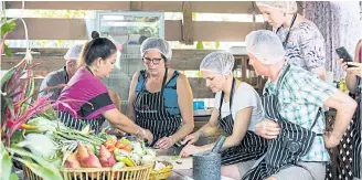  ??  ?? Learning to cook Thai food and plant rice are interestin­g activities some tour operators offer to tourists.