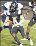  ?? Jeremy Stewart ?? Rockmart’s Keyshaun McCullough runs upfield for some yardage during the first quarter of Friday’s game against Cedar Grove at Rockmart High School.