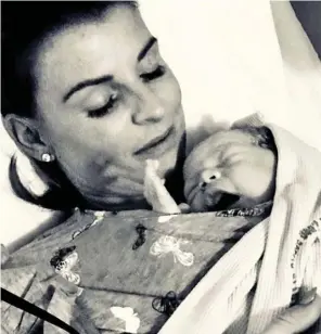  ??  ?? Son number four: Proud mum Coleen Rooney shows off newborn Cass