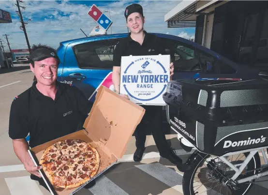  ?? EXPANSION PLANS: Business partners Nathan van Jole and Mandie Hiles at the new Domino’s in Mt Louisa. Picture: EVAN MORGAN ??