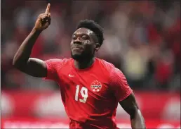  ?? ?? The Canadian Press
Canada’s Alphonso Davies celebrates his penalty kick goal against Curacao during a Nations League soccer match in Vancouver in June.