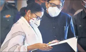  ?? PTI ?? Trinamool Congress leader Mamata Banerjee at the oath-taking ceremony for a third consecutiv­e term at the Governor’s House in Kolkata on Wednesday.