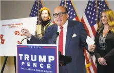  ?? Jacquelyn Martin / Associated Press ?? The court held that Rudy Giuliani made false statements while trying to get courts to overturn Donald Trump’s election loss.