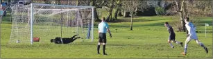  ??  ?? Craig MacEwan slots home the first of his two penalties in the match.