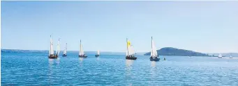  ??  ?? Whanga¯ rei Young Mariners leading the fleet in light winds at Lake Rotorua.