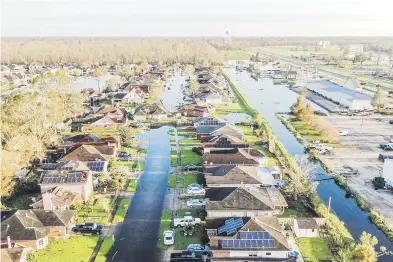  ?? efe/epa/tannen maury ?? El sureste de Luisiana, estado declarado zona de desastre, fue el más devastado por las inundacion­es y los fuertes vientos del potente huracán.