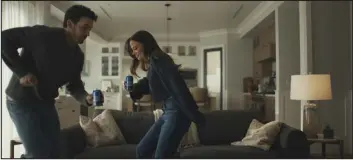  ?? BUD LIGHT VIA AP ?? Miles Teller and his wife, Keleigh Sperry Teller, dance in the Bud Light ad.