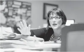  ?? TROY Fleece/leader-post ?? Allison Schmidt, a disability claims advocate, speaks at her office in Regina