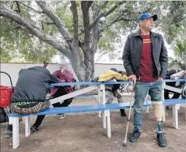  ?? Irfan Khan Los Angeles Times ?? A LANDMARK $138-million L.A. city spending plan for fighting homelessne­ss has so far faced difficulti­es in its implementa­tion. Above, a Pomona shelter.