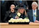  ?? GETTY ?? Above: Philippa Langley, who led the quest to find the remains of King Richard III, places a white rose on his coffin in 2015. Her quest has now been immortal,ised in the film The Lost King, left.