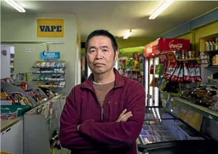  ?? ANDY MACDONALD/STUFF ?? Nick Guo, owner of Frankleigh Park Dairy in New Plymouth, closed for two hours yesterday as part of a nationwide protest in support of a slain dairy worker.