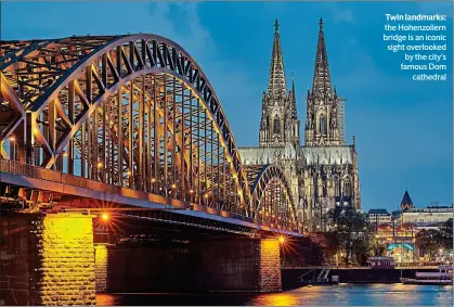  ?? ?? Twin landmarks: the Hohenzolle­rn bridge is an iconic sight overlooked by the city’s famous Dom cathedral